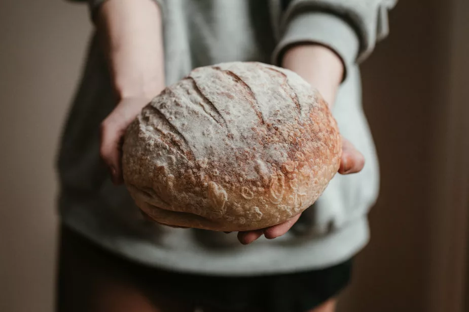 freshly-baked-bread-in-hands